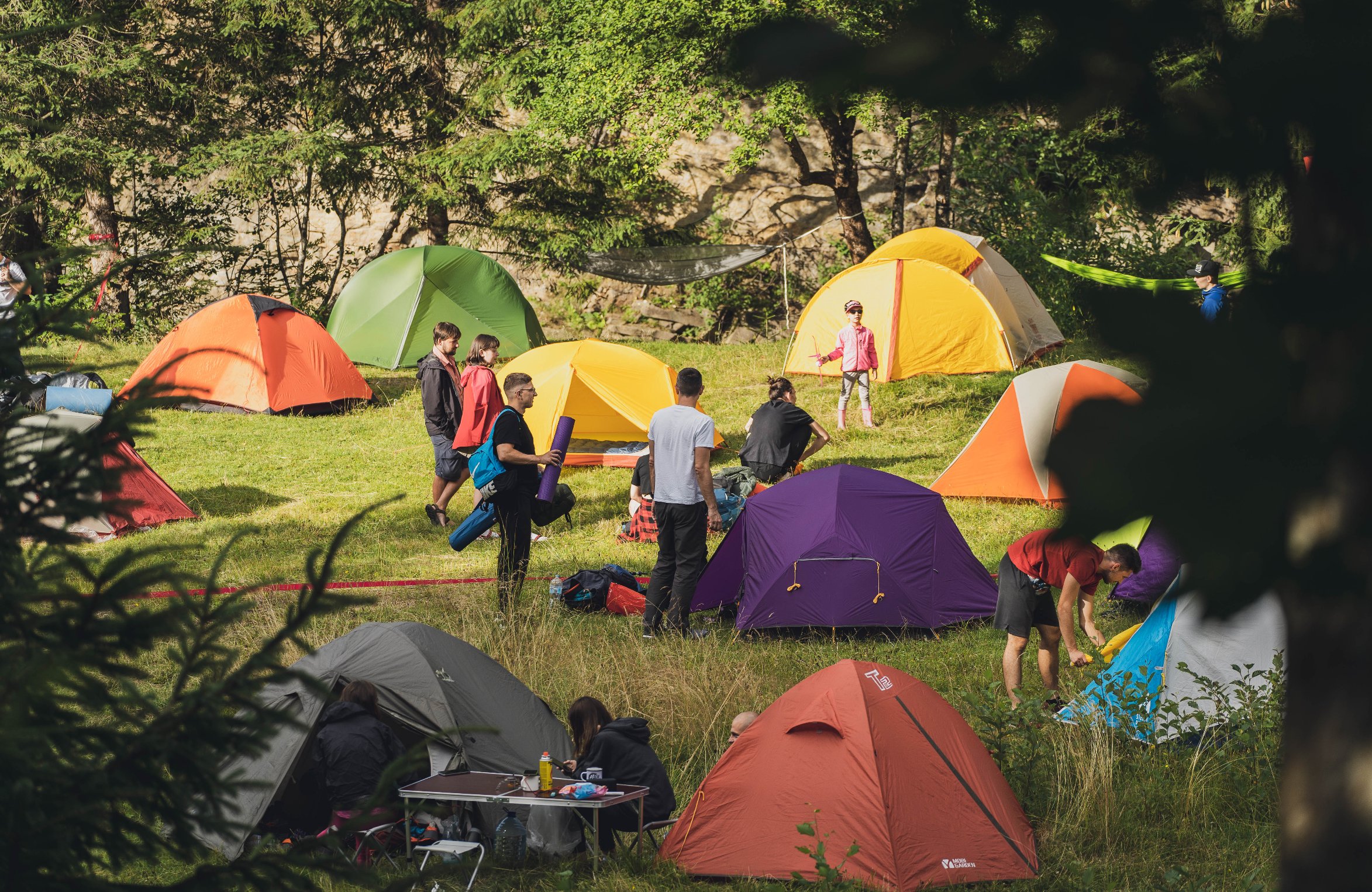 Colorful tents pitched in the festival camping field